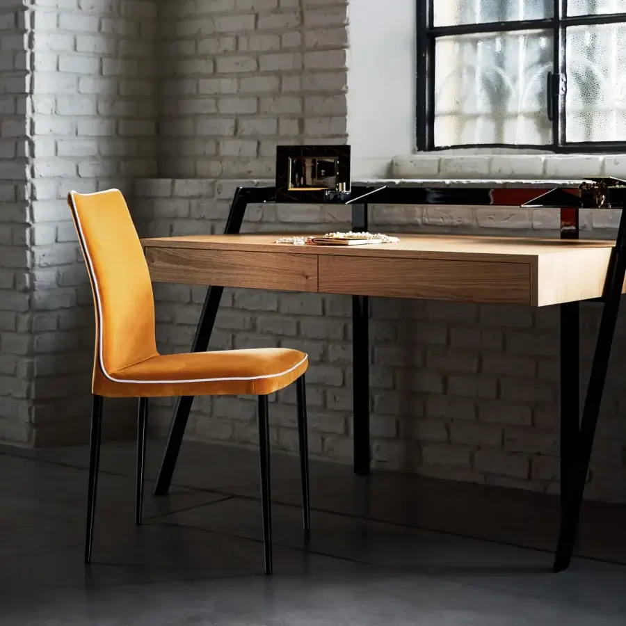 Exceptional Bontempi Nata chair crafted in Italy with vibrant orange textile upholstery and dark metal legs