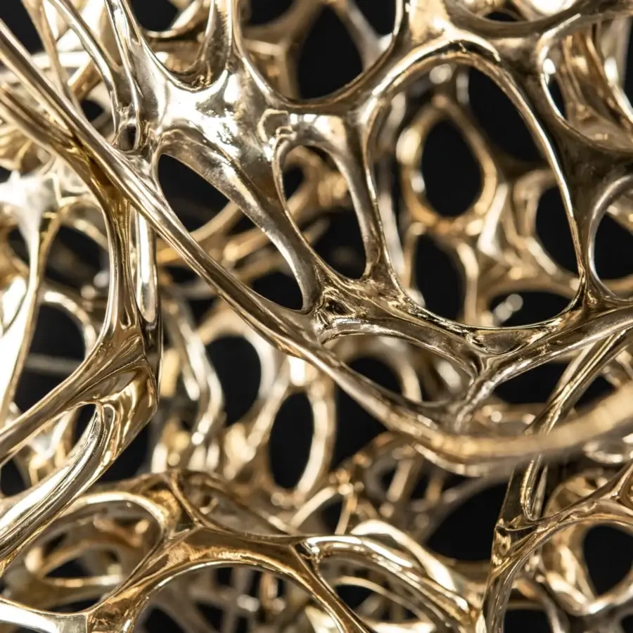 Distinguished Terzani Dragon suspended sculpture handcrafted in glossy golden metal evokes cosmic harmony with a unique cell-like structure