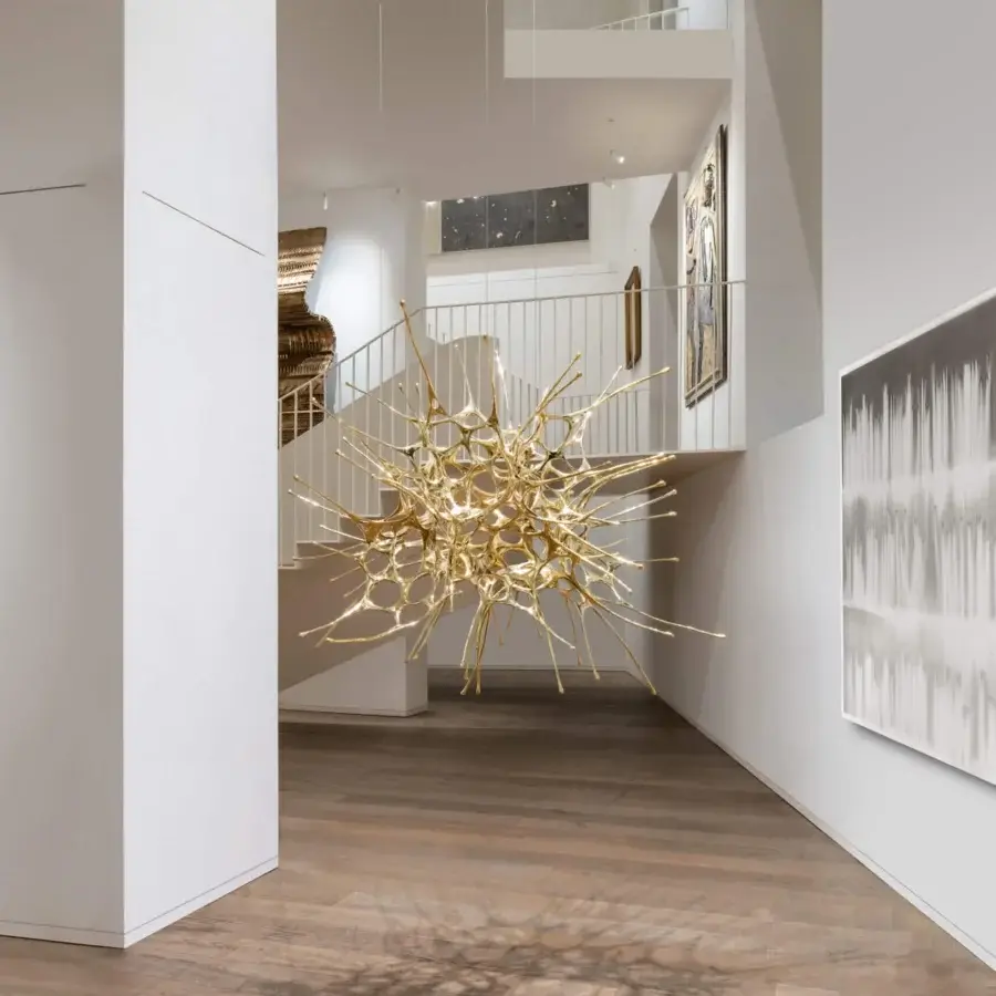 Superior Terzani Dragon suspension lamp handcrafted sculpture in glossy gold embodying interconnected branches and cosmic harmony