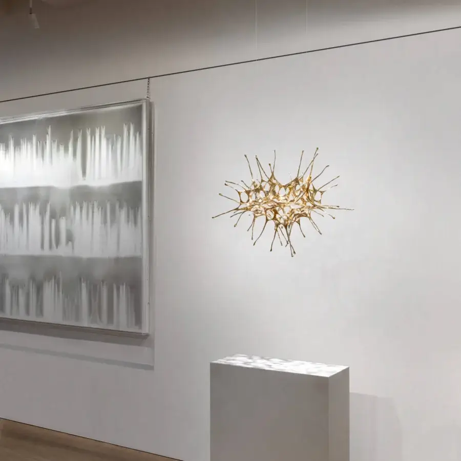 Distinguished Terzani Dragon suspension lamp handcrafted sculpture with gold-colored branch-like extensions evoking cosmic harmony