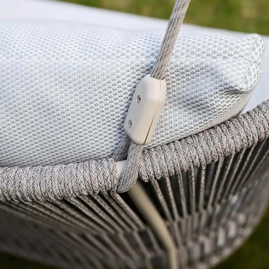 Distinguished Varaschin Tibidabo swing with curved lines crafted in light gray powder-coated aluminum and hand-woven Perla Rope