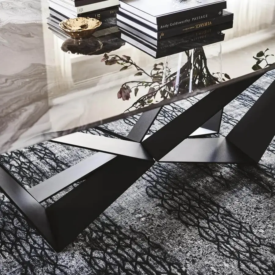 Distinguished Cattelan Italia Skorpio CrystalArt table with shaped extra-clear glass and marbled gray-white artistic print, built with black embossed lacquered steel