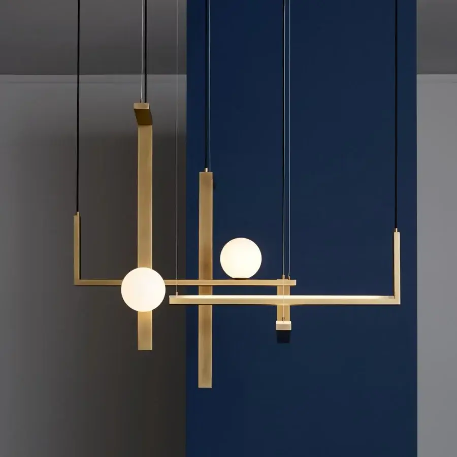 Exceptional VENICEM Less System 5 suspension lamp in burnished natural brass with sleek black cables and satin glass spherical diffusers