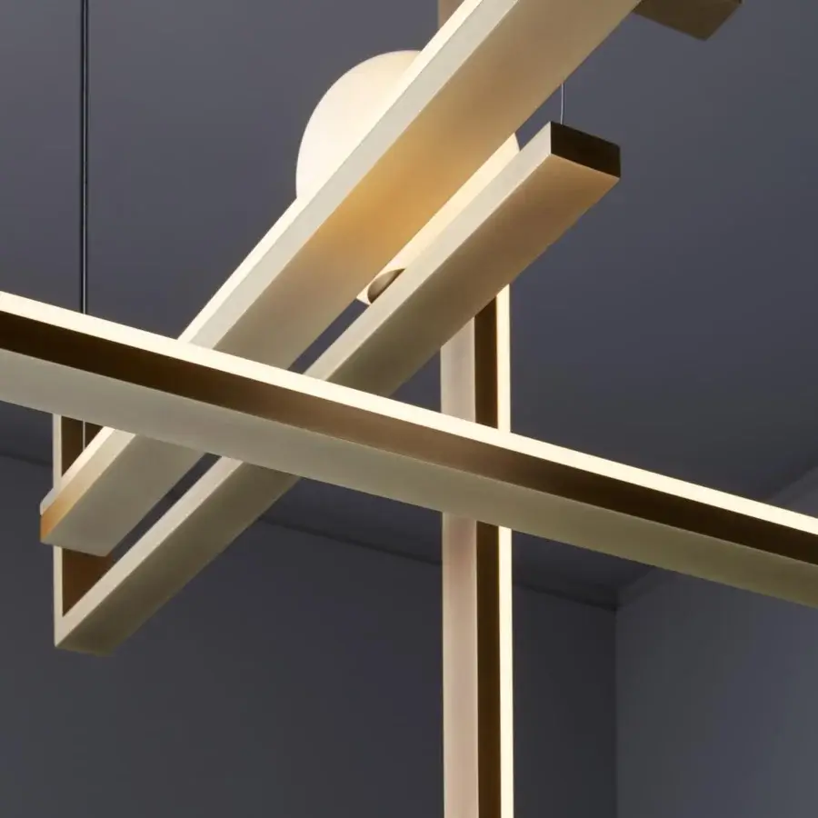 Elegant VENICEM Less System 5 suspension lamp with intersecting rectangular metal bars in burnished natural brass and frosted glass elements