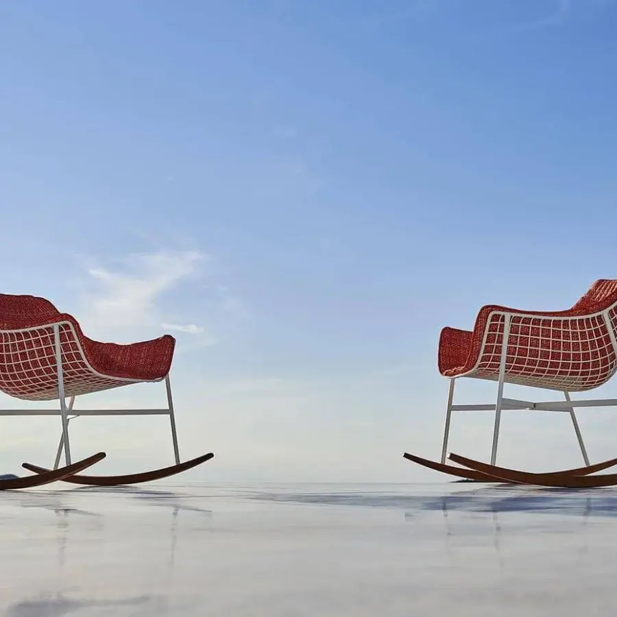 Exceptional Varaschin Summer Set rocking lounge chair with red woven seat, warm teak runners and white powder-coated steel frame