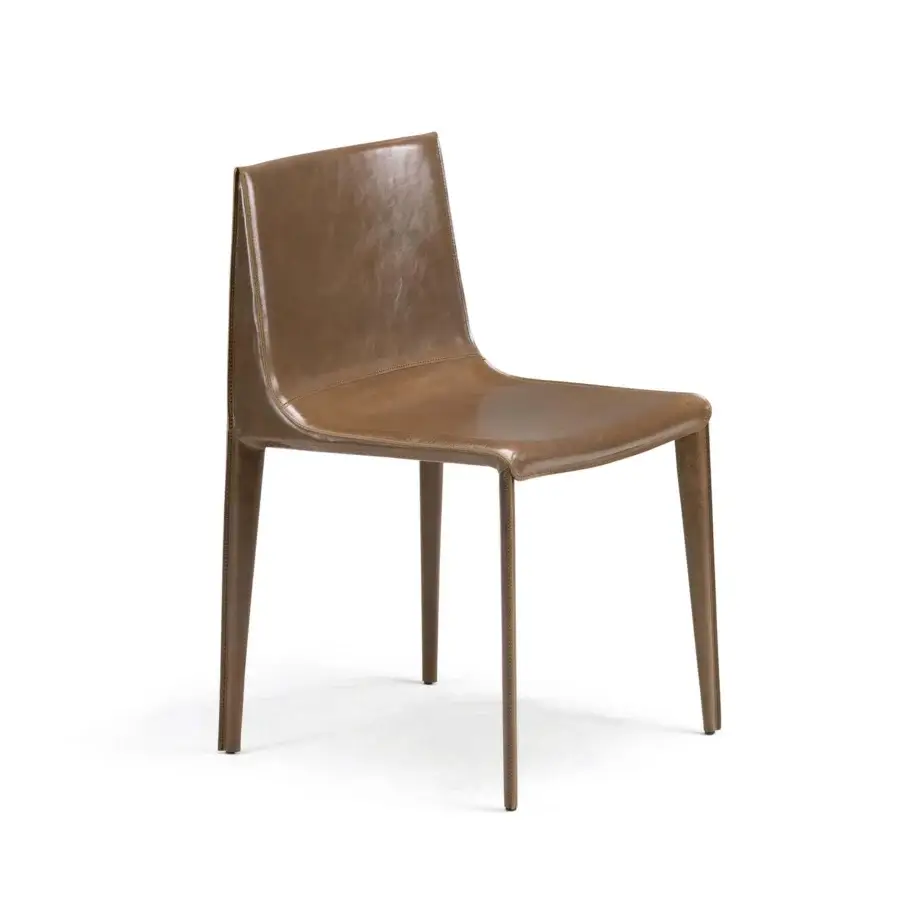 Distinguished Arketipo Emily chair upholstered in medium brown vegetable-tanned Tribe leather with a smooth uniform finish