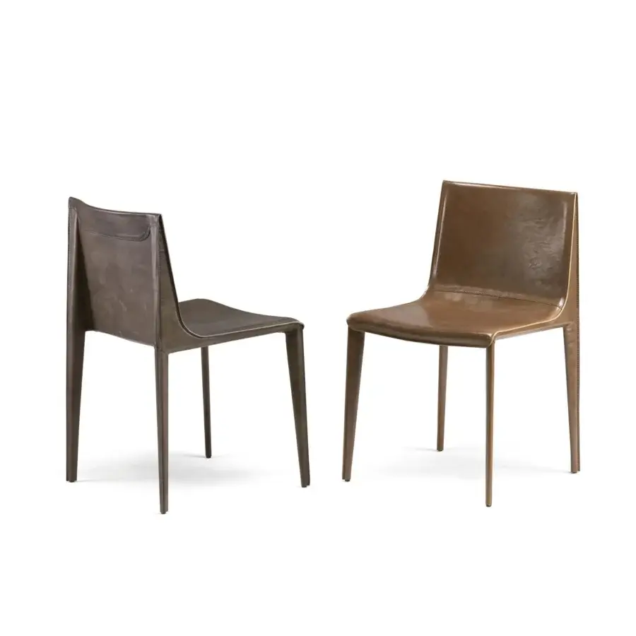 Sophisticated Arketipo Emily chair with wide seating and smooth vegetable-tanned Dirt leather upholstery presenting a uniform finish