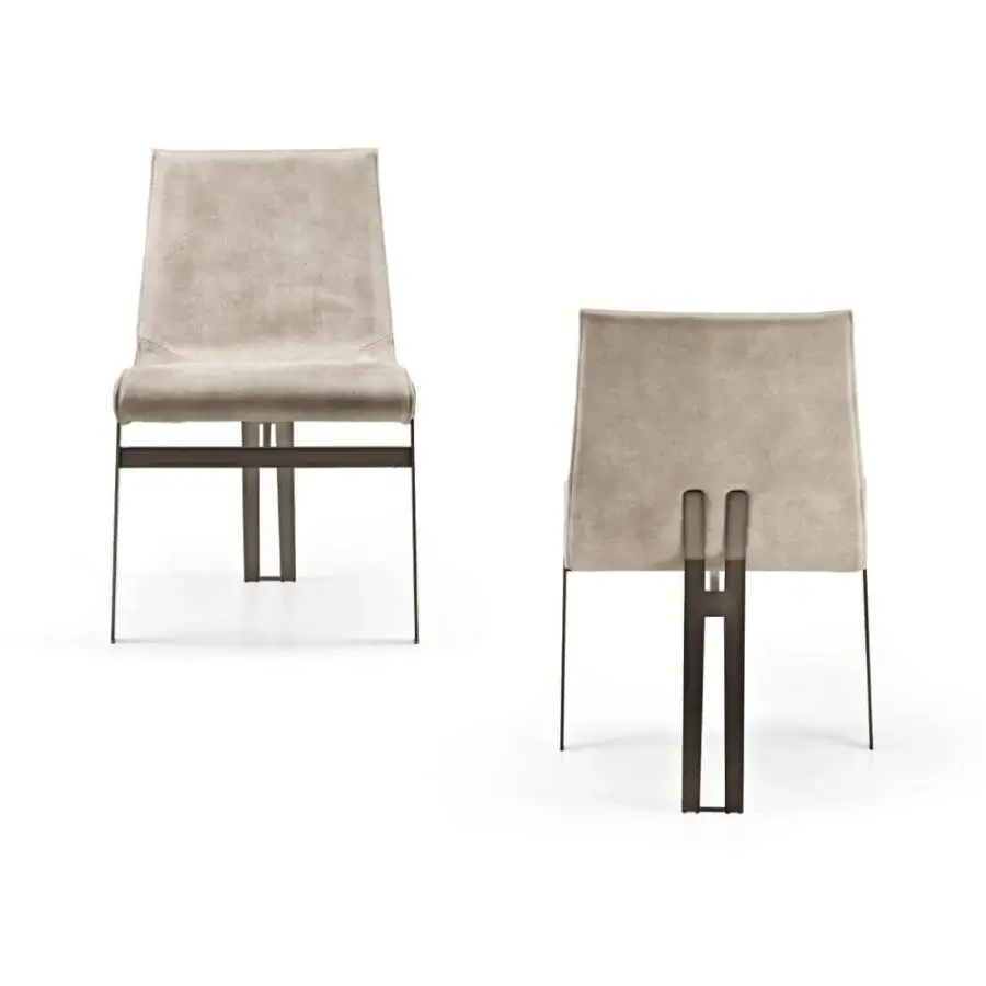 Exceptional Arketipo Venus chair clad in light beige textile with a subtle matte finish and dark bronze metal frame