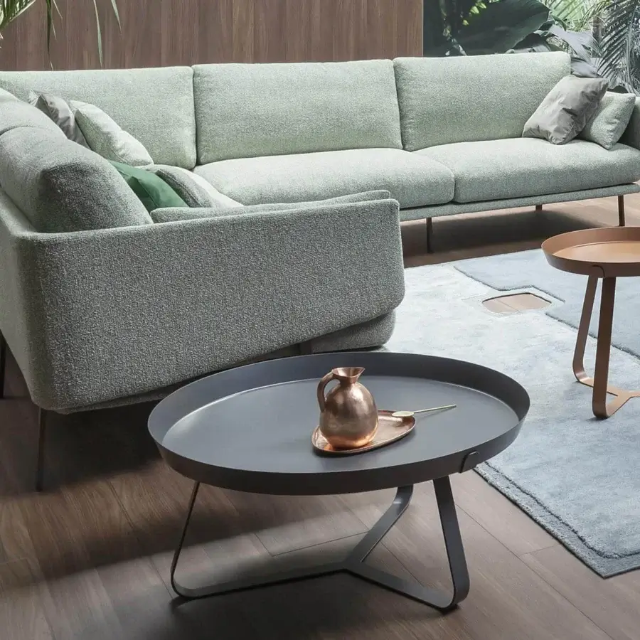 Distinguished Bonaldo Frinfri table with circular silhouette and matte gray metal tray supporting a curated display