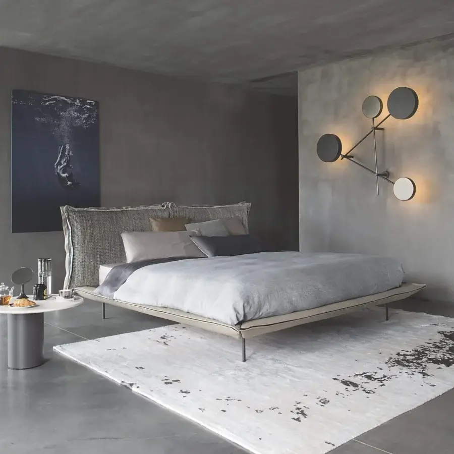 Elegant Arketipo Iride wall lamp with geometric circular lights and micaceous brown metal structure in titanium finish