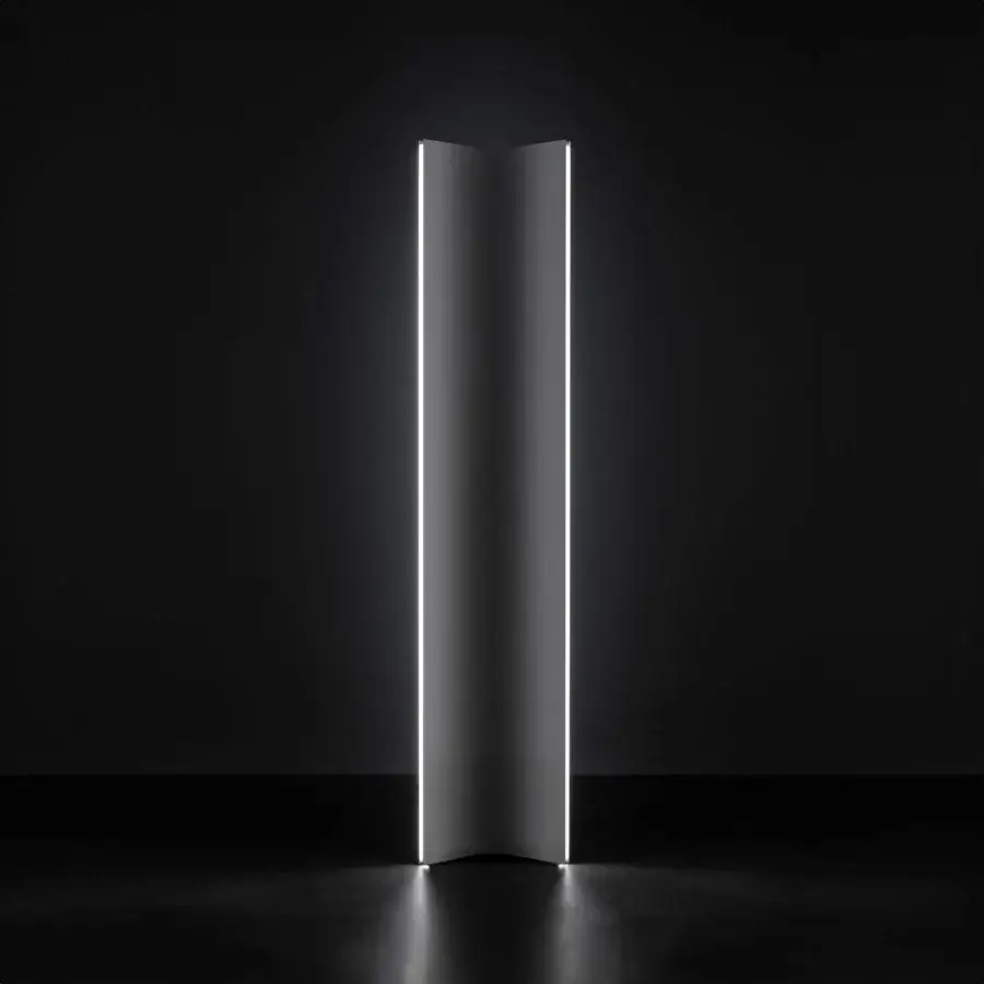 Distinguished Terzani Stanley floor lamp with V-shaped panels in matte gray, crafted in Italy as a modern homage to cinematic design
