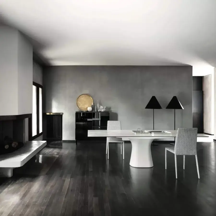 Exceptional Bontempi Podium table with sinuous lines and a glossy white marble tabletop built upon a solid white concrete base