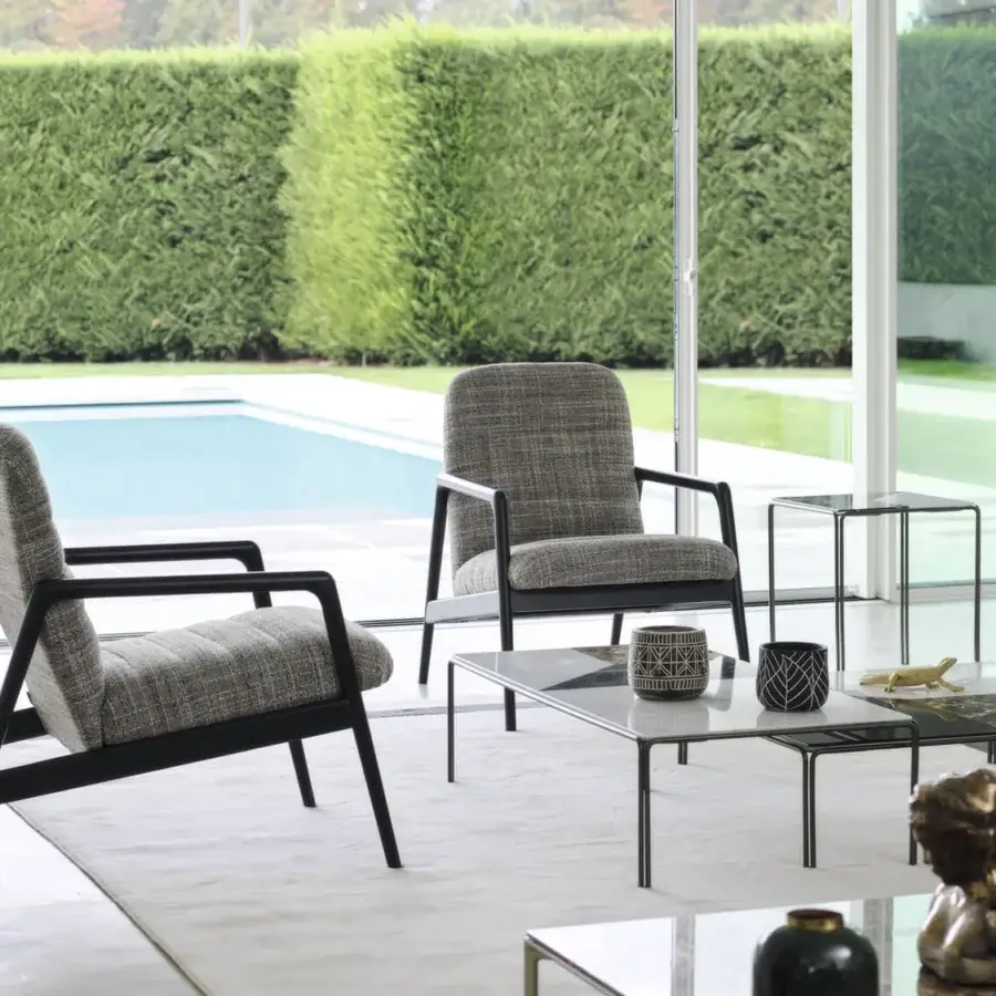Distinguished Horm Ragtime coffee table crafted with Carrara and Marquina marble plus bronze painted metal structure