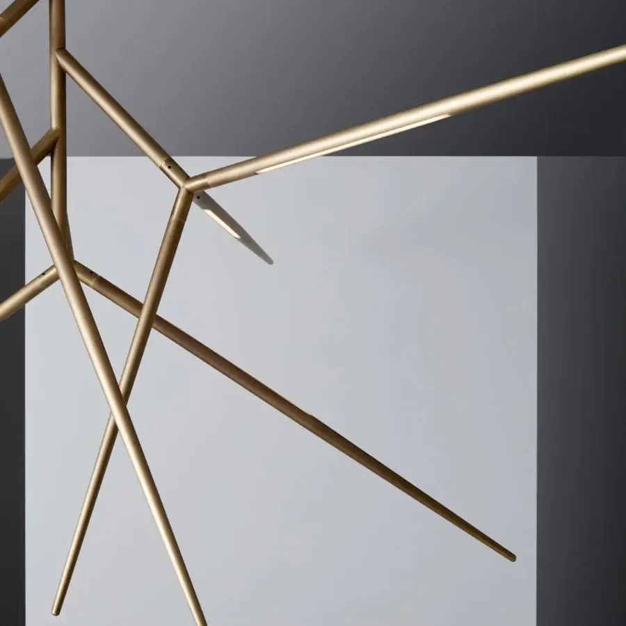 Sophisticated VENICEM Spear chandelier with abstract geometric form in burnished brass and a modern metal structure