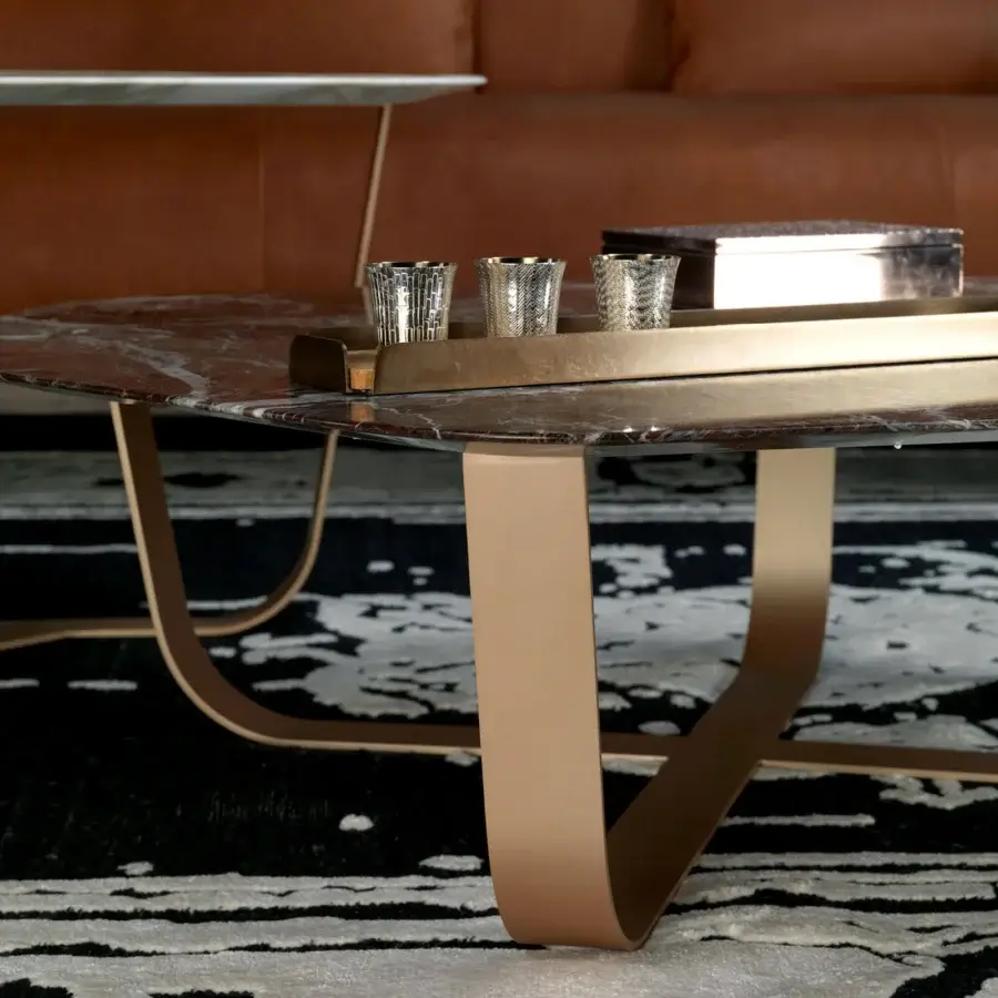 Superior Borzalino Ground coffee table with reddish-brown marble top and curved satin gold lacquered metal legs