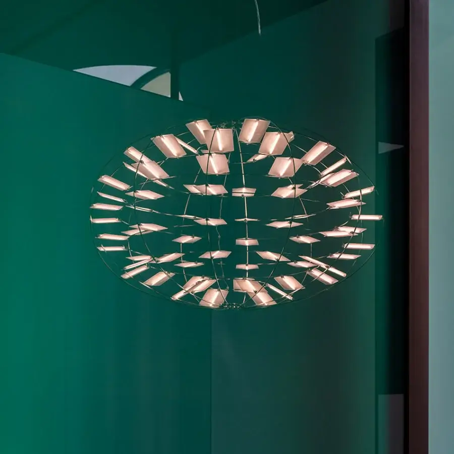Innovative Nemo Chloris suspension lamp explores atmospheric design with a spherical frame built in smooth metal and light polycarbonate diffusers