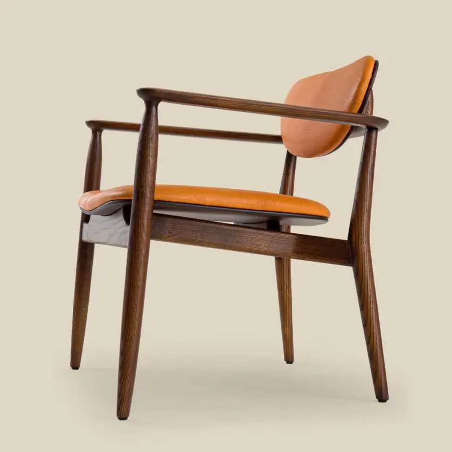 Distinguished Borzalino Regina lounge chair with tan leather upholstery and dark brown solid wood construction