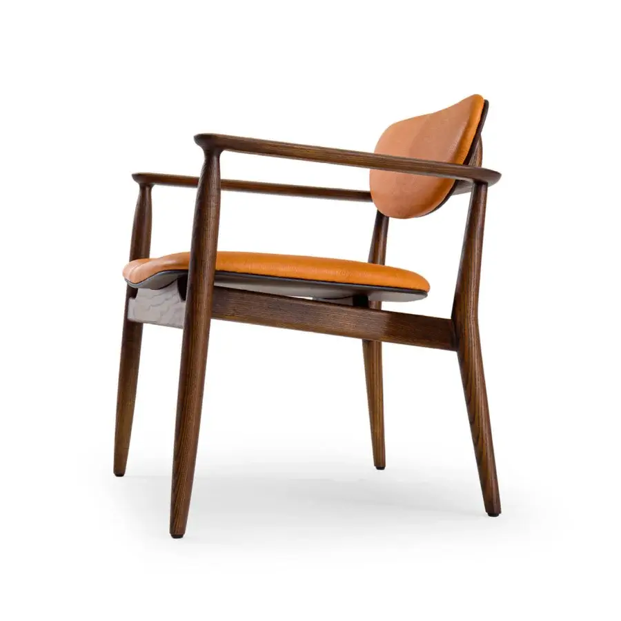 Distinguished Borzalino Regina lounge chair with solid wood structure and plush caramel upholstery exhibiting a smooth finish