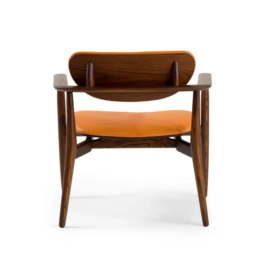 Lavish Borzalino Regina lounge chair with solid wood structure and plush orange upholstery crafted in Italy