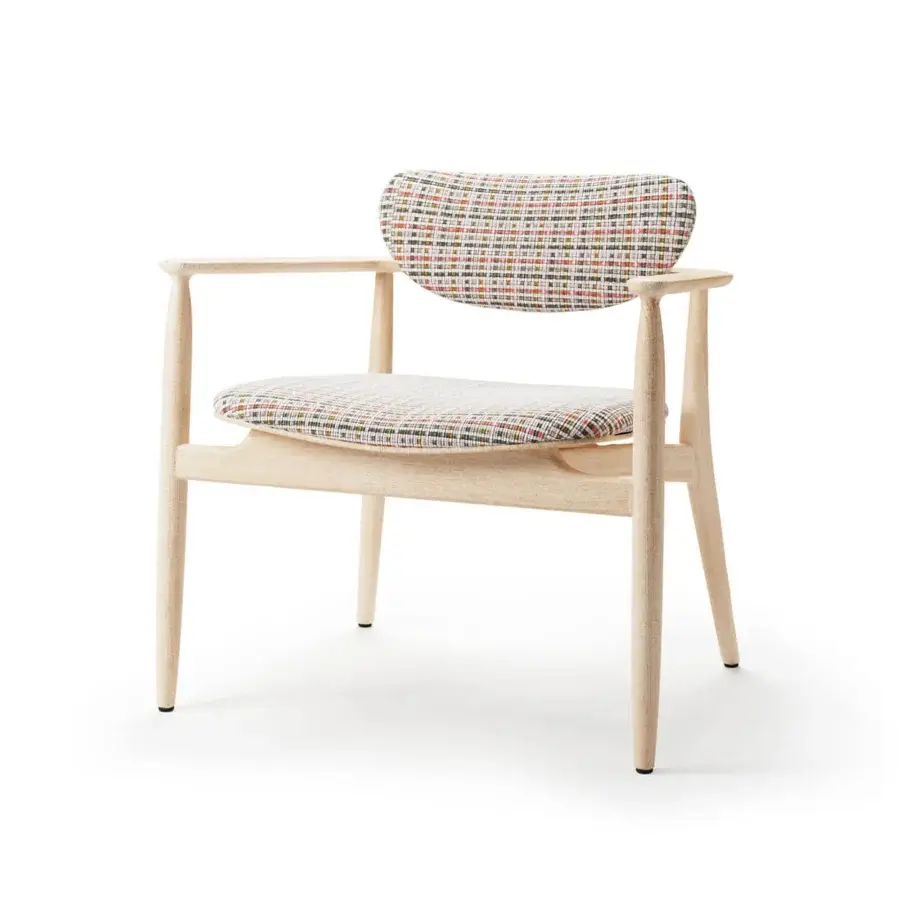 Sophisticated Borzalino Regina lounge chair with solid wood structure and multicolored patterned textile upholstery