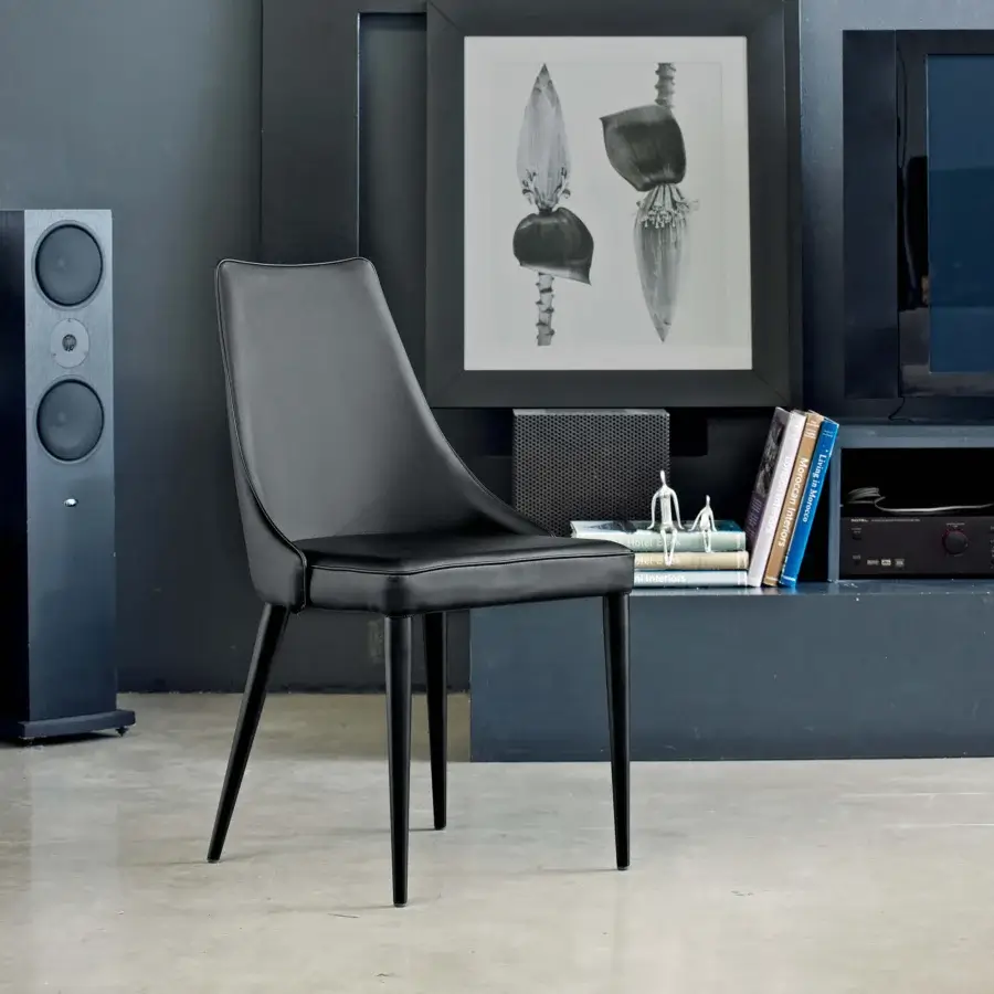 Superior Bontempi Clara chair with dark synthetic leather upholstery and slender black metal legs exhibiting a matte finish