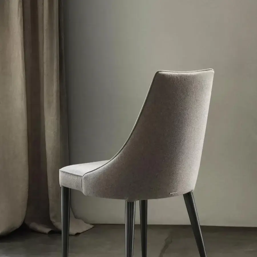 Distinctive Bontempi Clara chair with quilted back, matte medium gray textile upholstery and sleek metal legs