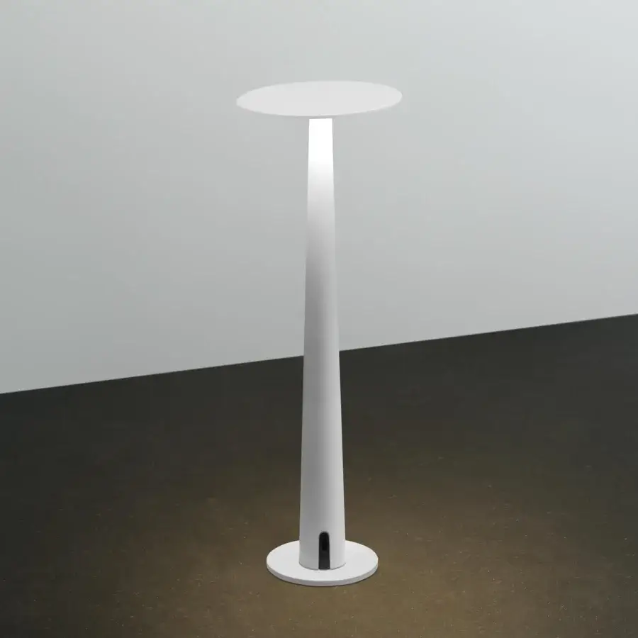 Distinguished Nemo Portofino table lamp in smooth matte white aluminum emits warm light for contemporary spaces crafted in Italy
