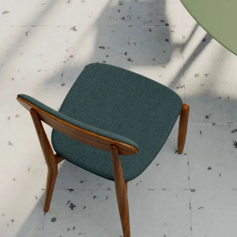 Captivating Borzalino Regina chair with dark blue-green textile upholstery and smooth solid wood structure
