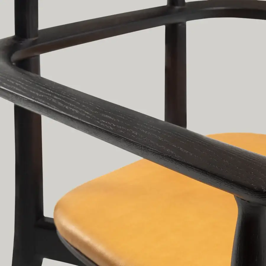 Distinguished Borzalino Regina chair with a black wood frame and light brown leather upholstery crafted in Italy