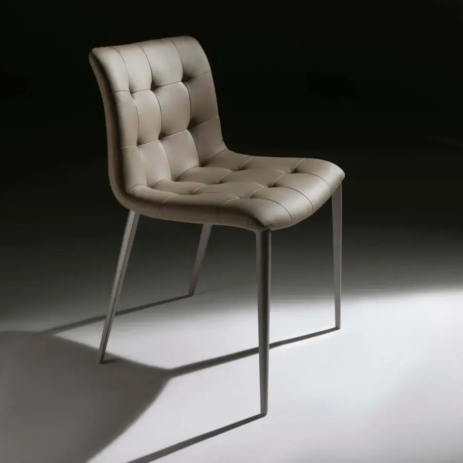 Distinguished Bontempi Kuga chair upholstered in light brown with button-tufting and a matte gray metal frame