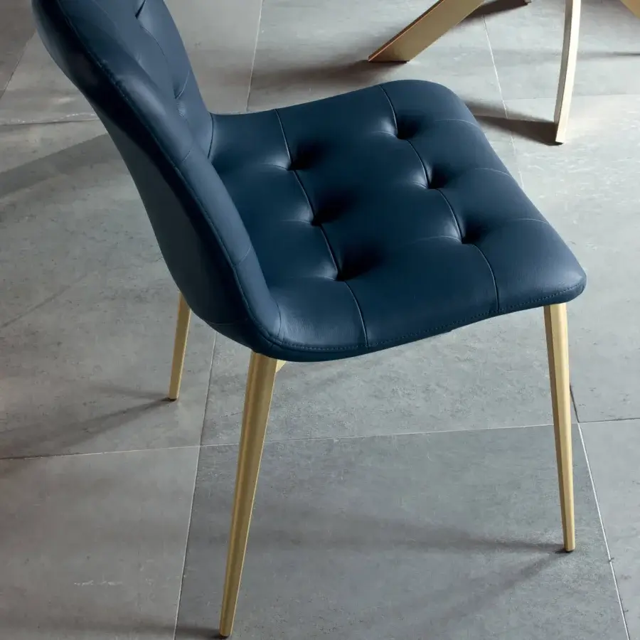 Exceptional Bontempi Kuga chair with dark blue padded seating and gold finished tapering metal legs