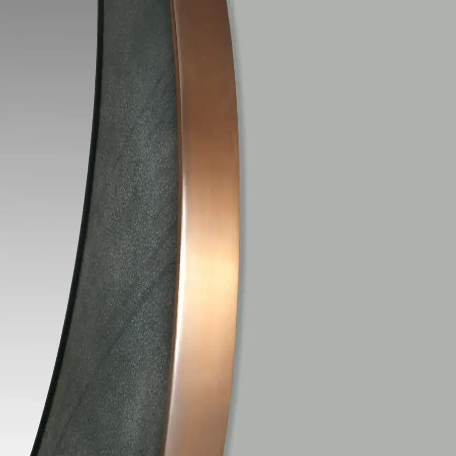 Superior Borzalino Eclipse mirror with a round silhouette crafted in treated brass metal and dark gray textured material with a polished finish