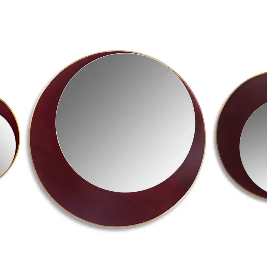 Exceptional Borzalino Eclipse mirror crafted in treated brass metal with reddish-brown leather and gold-toned accents