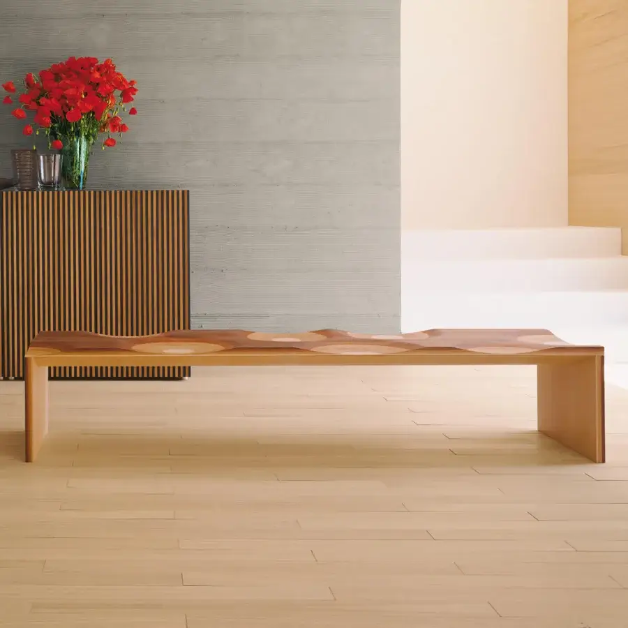 Distinguished Horm Ripples bench crafted in laminated walnut, mahogany, cherry, oak, and ash with a hand-finished undulating surface
