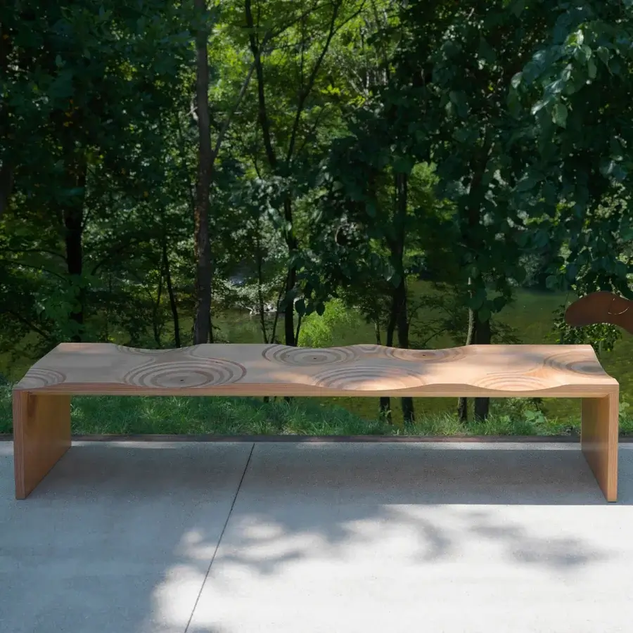 Elegant Horm Ripples bench crafted in Italy with undulating okoume wood exhibiting a light natural finish