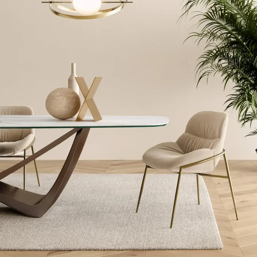 Superior Bontempi Amelie chair with gently curved upholstered form and gold-toned metal legs in beige textile