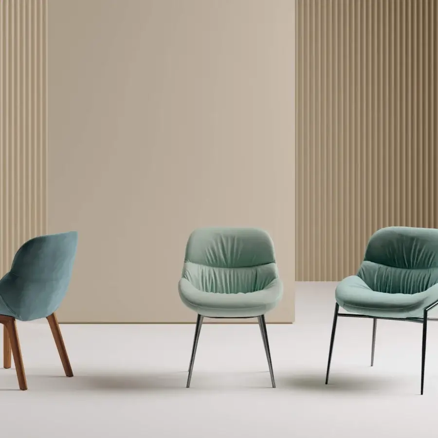 Sophisticated Bontempi Amelie chair with curved upholstered seat and thin black metal legs