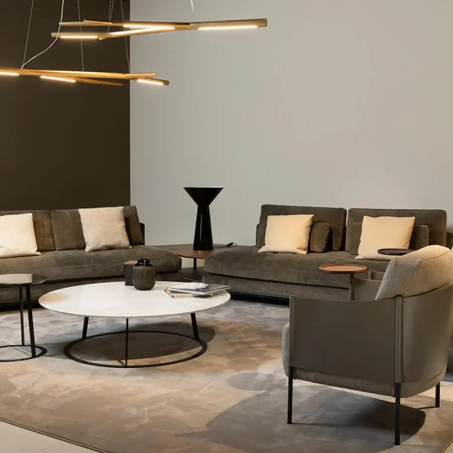 Superior Horm SC1 lounge chair crafted in textured medium gray textile with Canaletto walnut accents and black painted metal legs