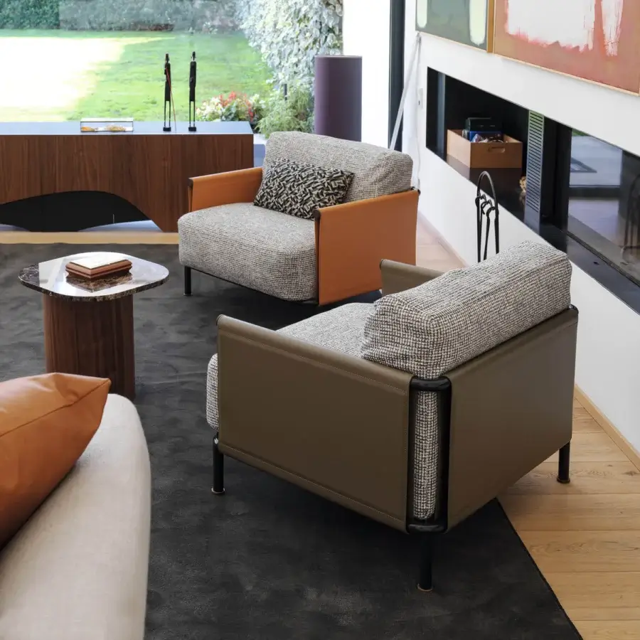 Distinguished Horm SC2 lounge chair with textured gray fabric upholstery, Canaletto walnut details and leather armrests
