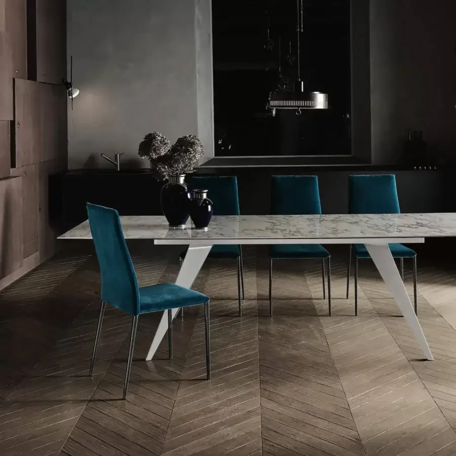 Superior Bontempi Tai chair with teal textile and slender metal legs exhibiting a smooth finish