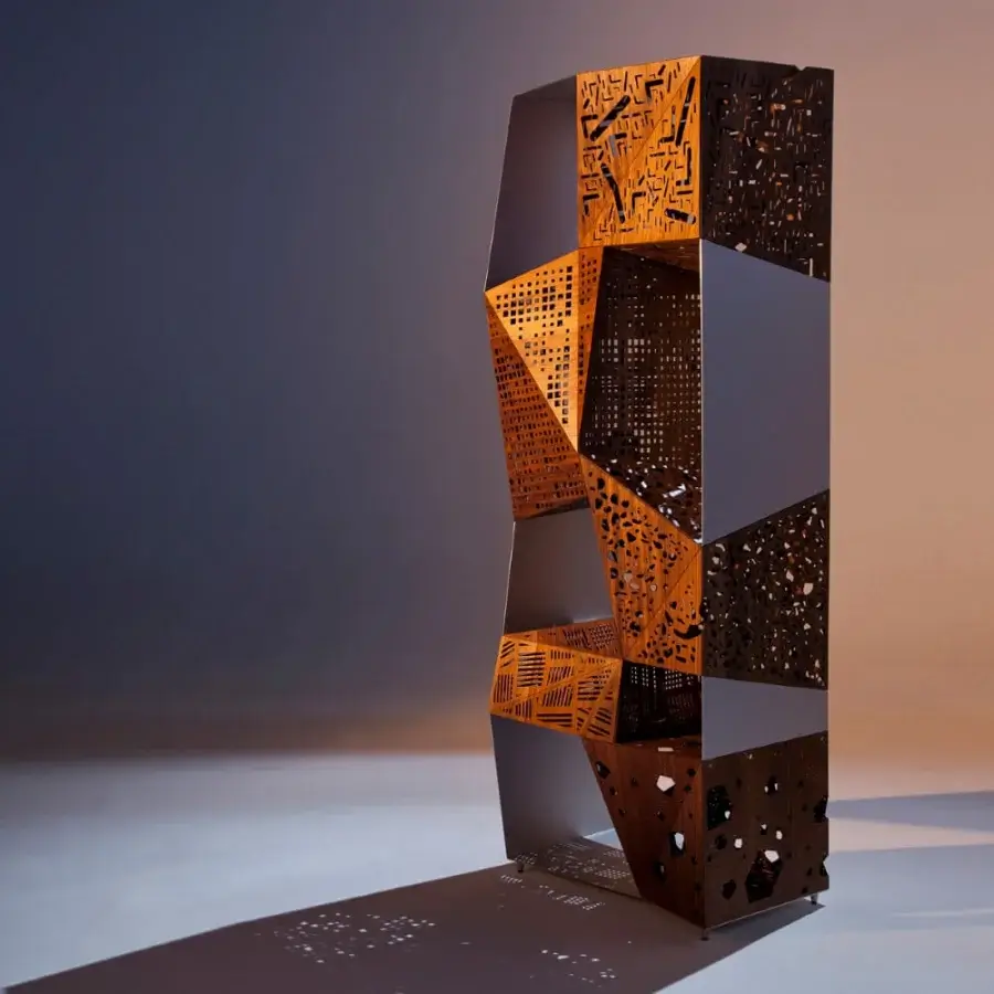 Distinguished Horm Riddled Totem storage unit crafted with an aluminum frame and five origami-folded wooden sections exhibiting intricate cut-out patterns