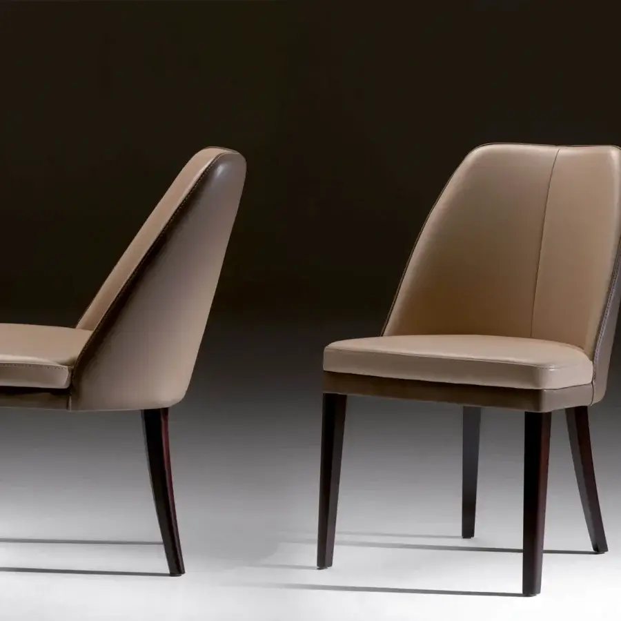 Superior Borzalino Julie chair with smooth light tan leather upholstery and dark-toned solid oak base crafted with a smooth finish