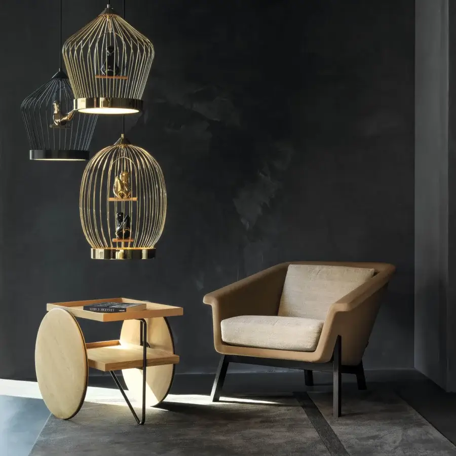 Lavish Horm Sienna lounge chair with enveloping comfort upholstered in light brown textile and dark wooden legs