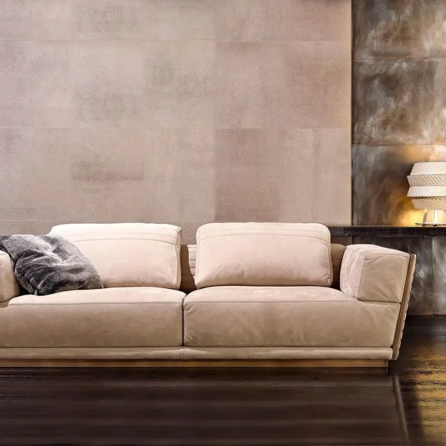Elegant Rugiano Empire sofa upholstered in light beige textile with matte finish and bronze metal base