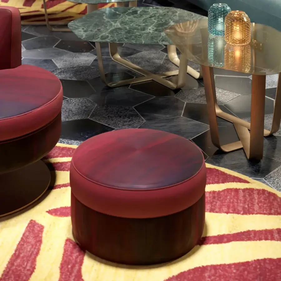 Lavish Borzalino Frisbee ottoman with ombré red textile upholstery and poplar plywood structure