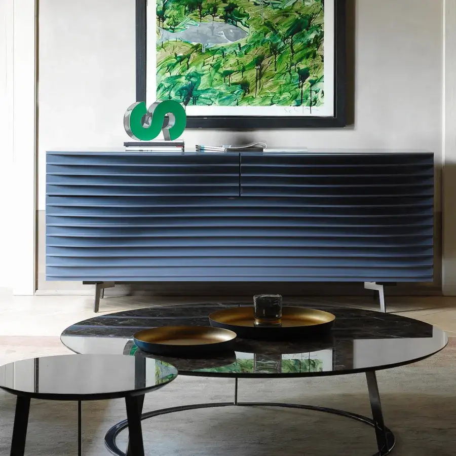 Captivating Horm Tide sideboard built with sculpted MDF sheets in a uniform muted blue and satin metallic legs