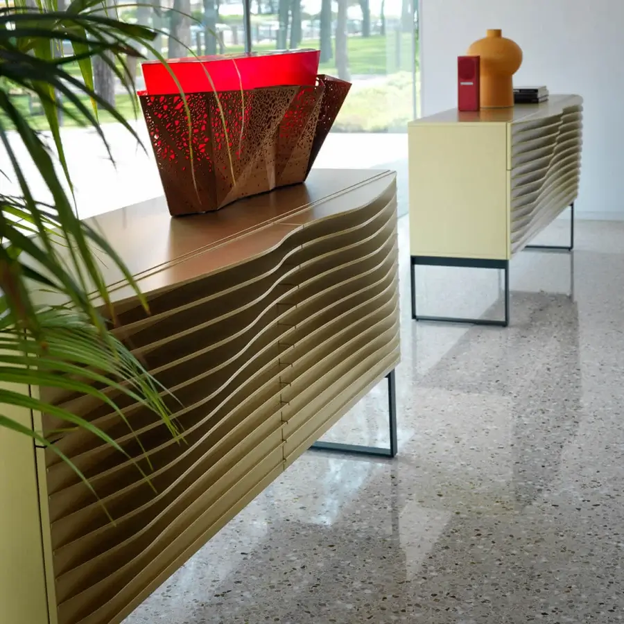 Exceptional Karim Rashid Horm Tide sideboard with sculpted front, light yellow MDF and dark metal legs