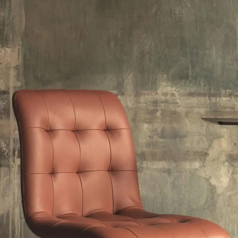 Exceptional Bontempi Kuga stool built with salmon leather upholstery and a tufted design for balanced style