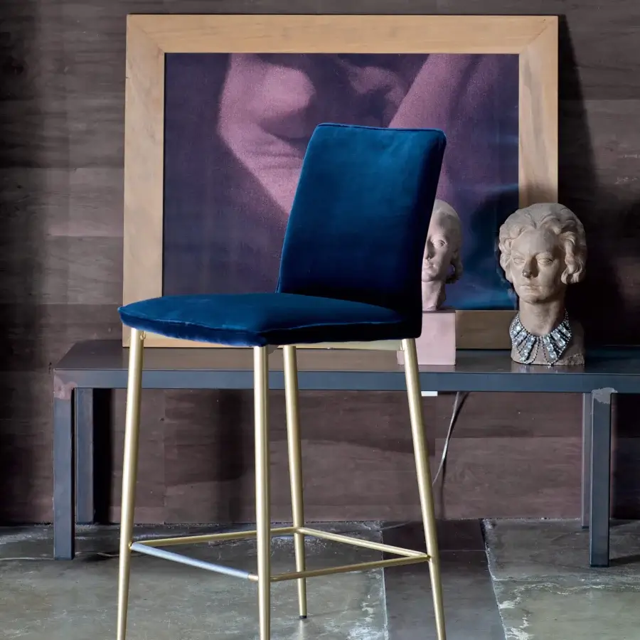 Lavish Bontempi Nata stool upholstered in deep blue velvet with golden metal legs and a horizontal bar