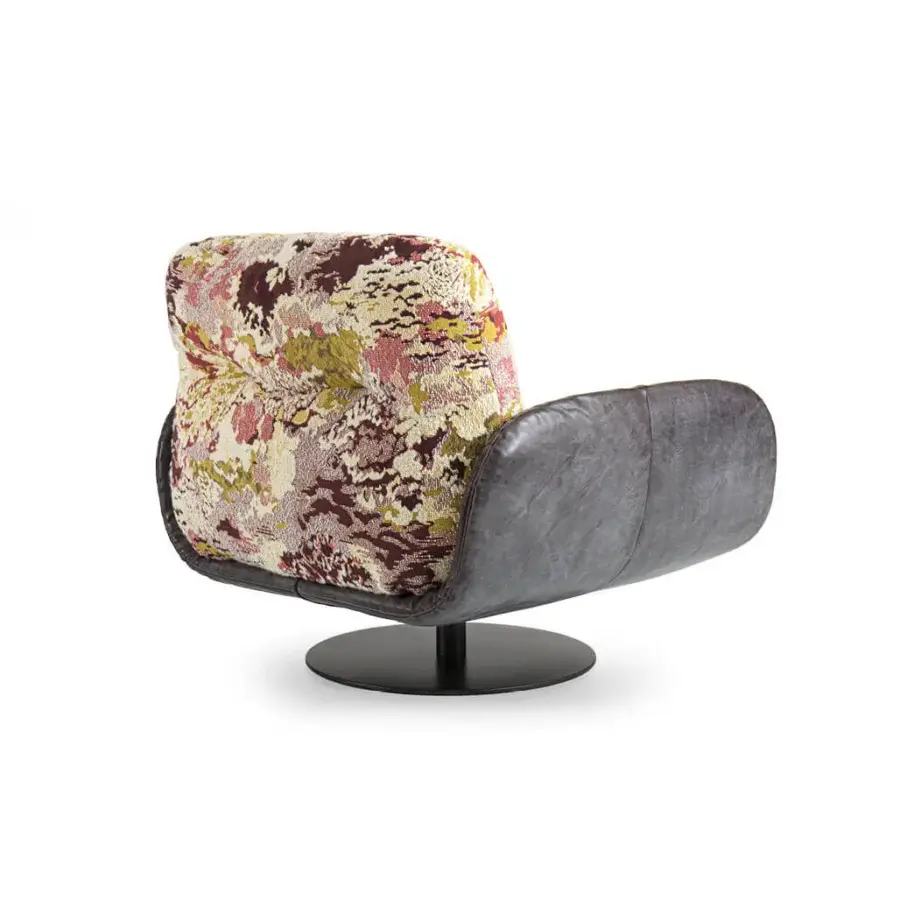 Exceptional Borzalino Ayton lounge chair crafted with patterned fabric cushions and dark leather upholstery with black lacquered metal feet
